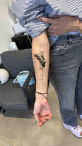 Mockup tattoo - Wing and Typography Composition - Inner forearm - Vytautas Tattoo