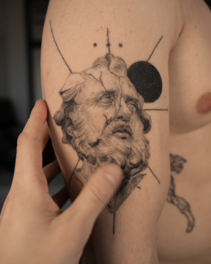 4+ years healed tattoo - Fragmented Classical Portrait - Upper arm - Vytautas Tattoo