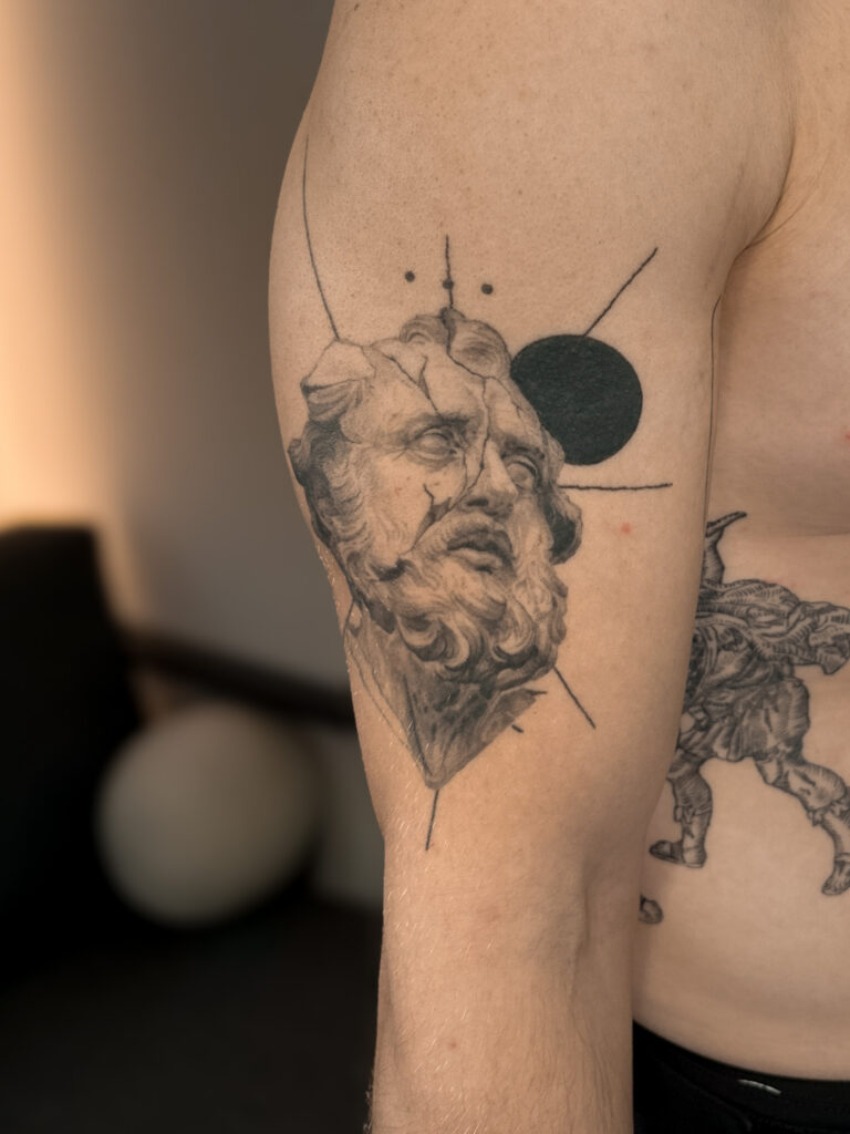2+ years healed tattoo - Fragmented Classical Portrait - Upper arm - Vytautas Tattoo