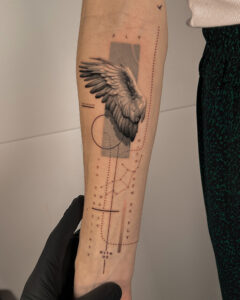 Fresh tattoo - Wing and Typography Composition - Inner forearm - Vytautas Tattoo