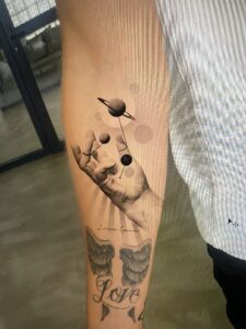 Mockup tattoo - Cosmic Hand Tattoo - Forearm - Vytautas Tattoo