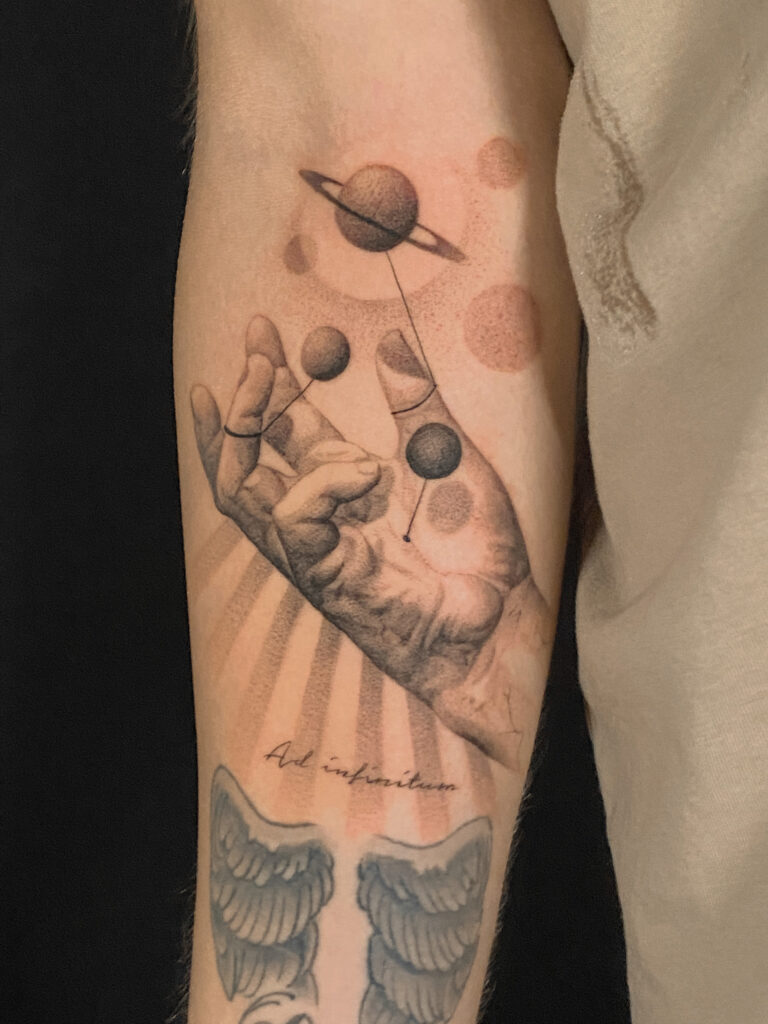 Fresh tattoo - Cosmic Hand Tattoo - Forearm - Vytautas Tattoo