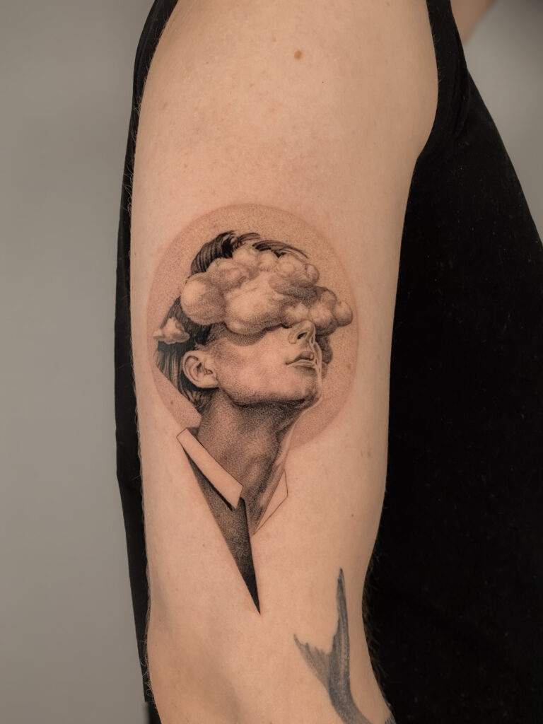Fresh tattoo - Portrait with Clouds - Upper arm - Vytautas Tattoo
