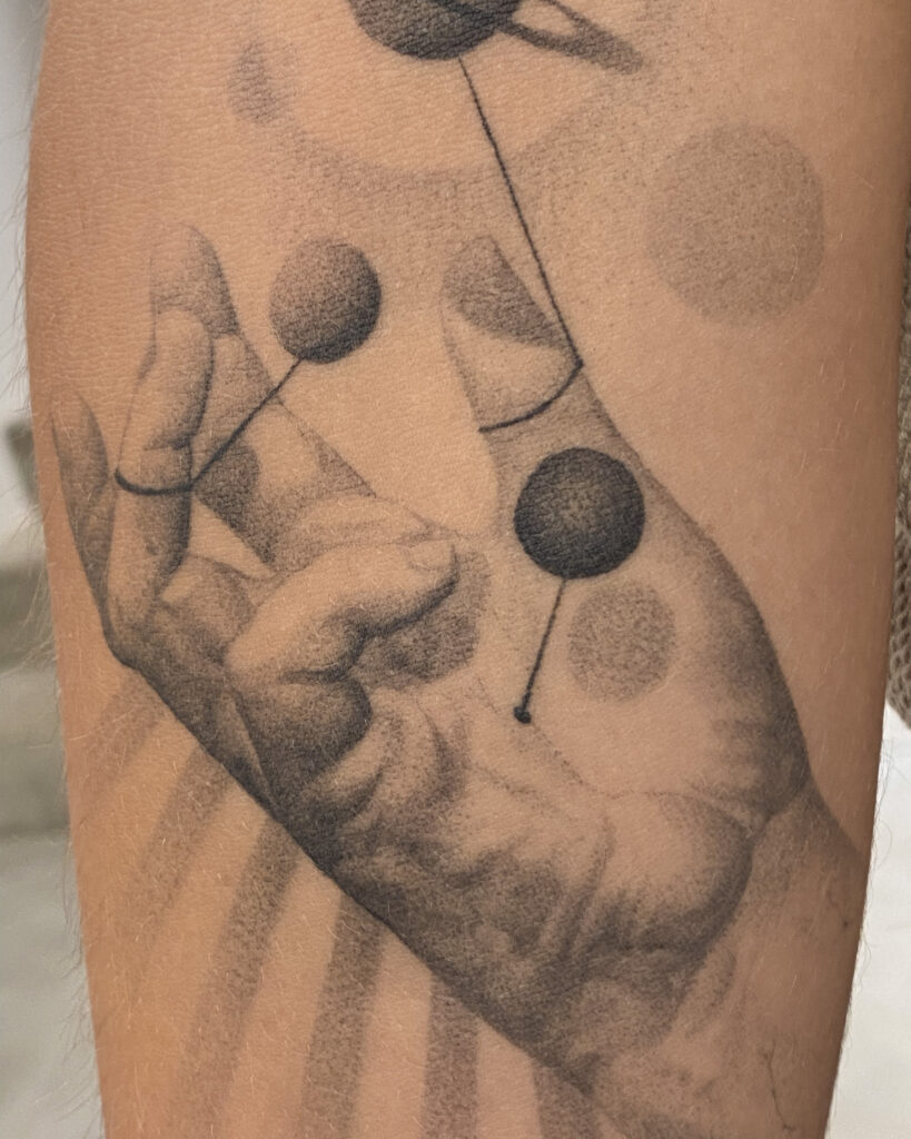 2 months healed tattoo - Cosmic Hand Tattoo - Forearm - Vytautas Tattoo