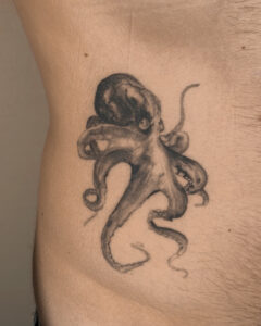 11 months healed tattoo - Octopus Tattoo - Ribcage - Vytautas Tattoo