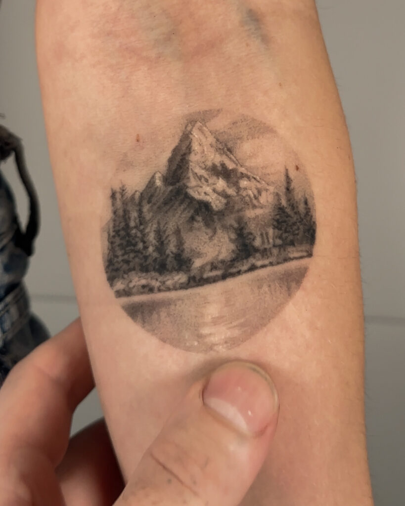 2+ years healed tattoo - Mountain Lake Tattoo - Upper arm - Vytautas Tattoo