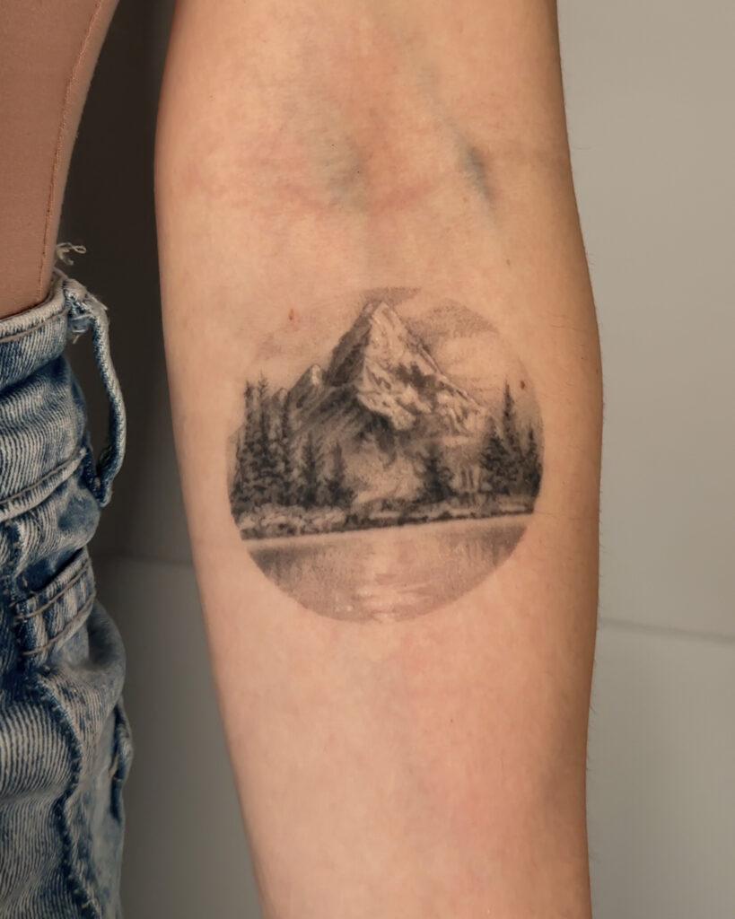 2+ years healed tattoo - Mountain Lake Tattoo - Upper arm - Vytautas Tattoo